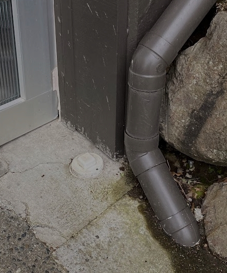 sewer cleanout with downspout